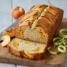 Freshly baked easy peach zucchini bread with peaches and zucchini